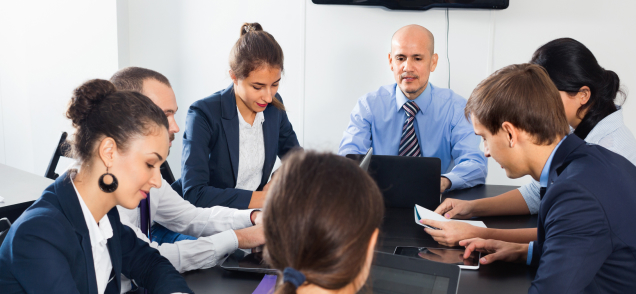 Team meeting about a local business